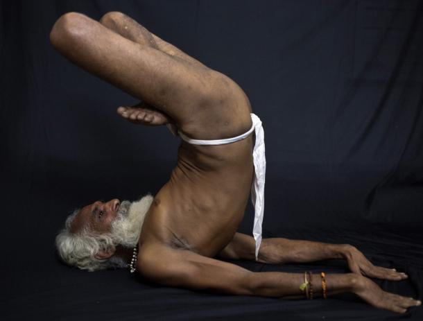 ndia's holy men practising yoga 14