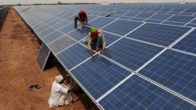 Indian workers give the finishing touche