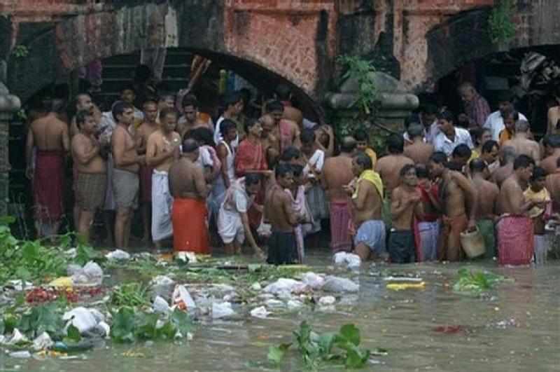 people bathing in ganges