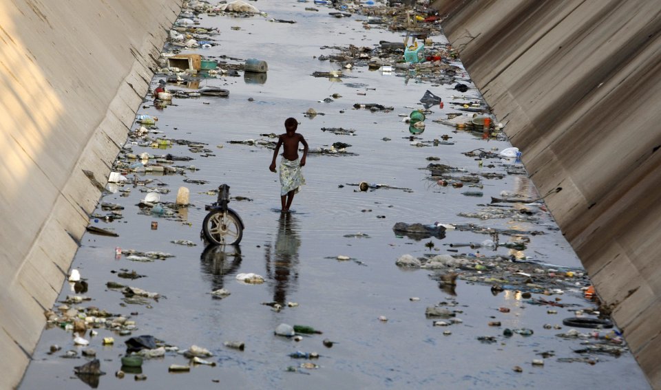 a polluted canal in Benguela, Angola