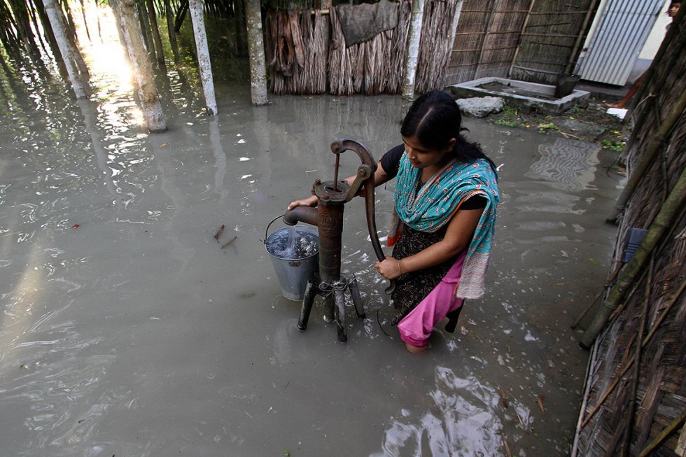 A submerged hand-pump at Dhuhibala village in Assam