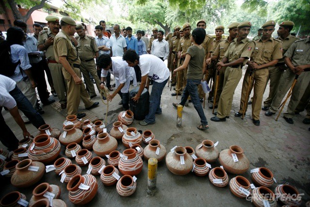 Greenpeace activists deposit water in the RBI