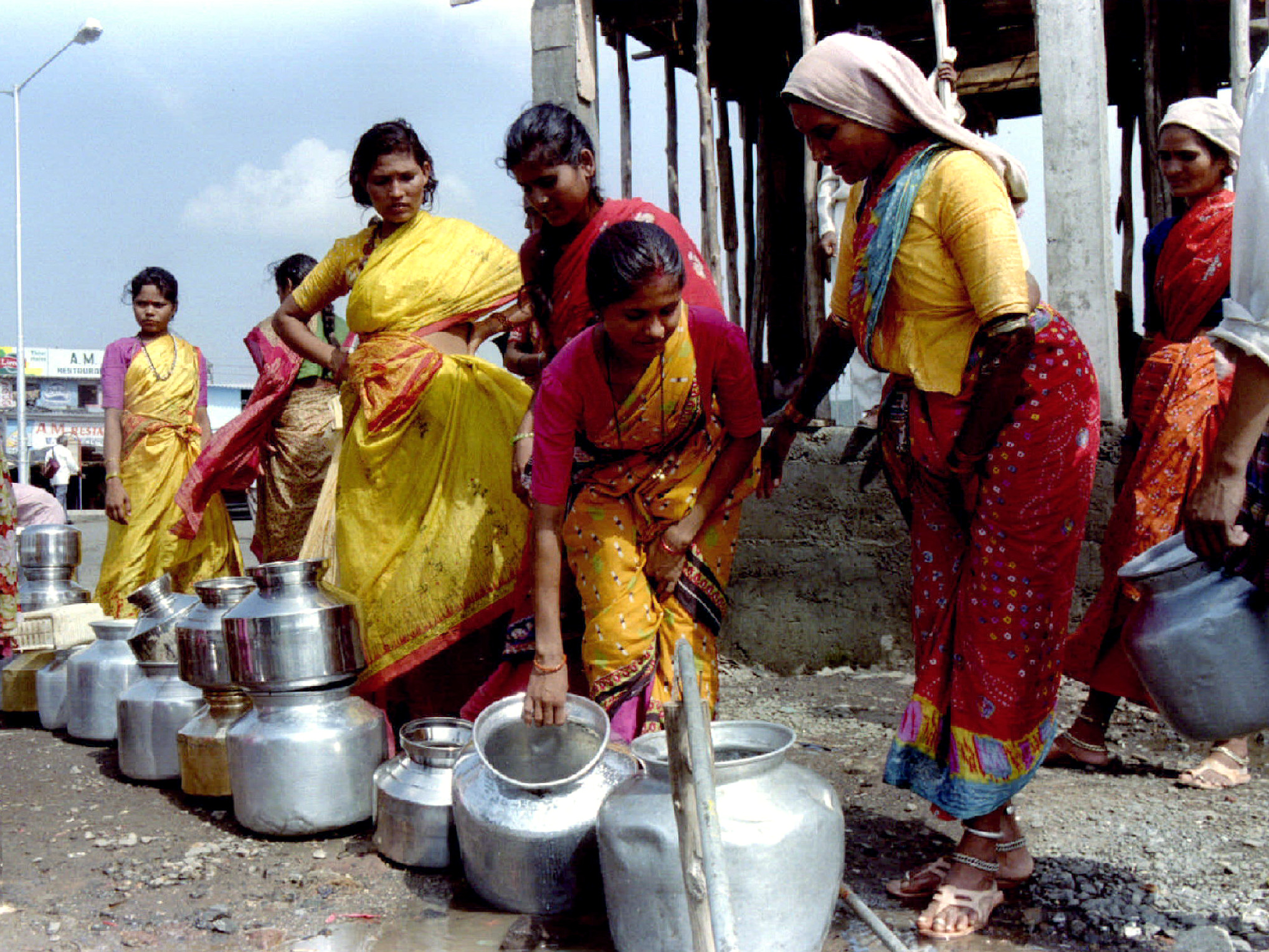 Lined up to collect drinking water in Bombay