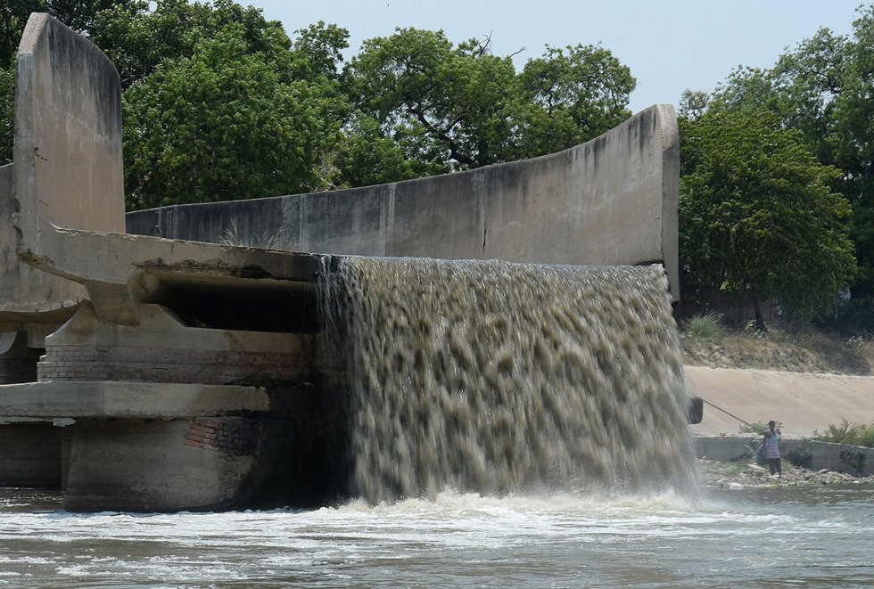 Untreated sewage waste falling into the river Ganges in Kanpur