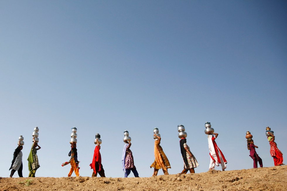 Villagers walking miles to fetch water in Meni village in Gujarat