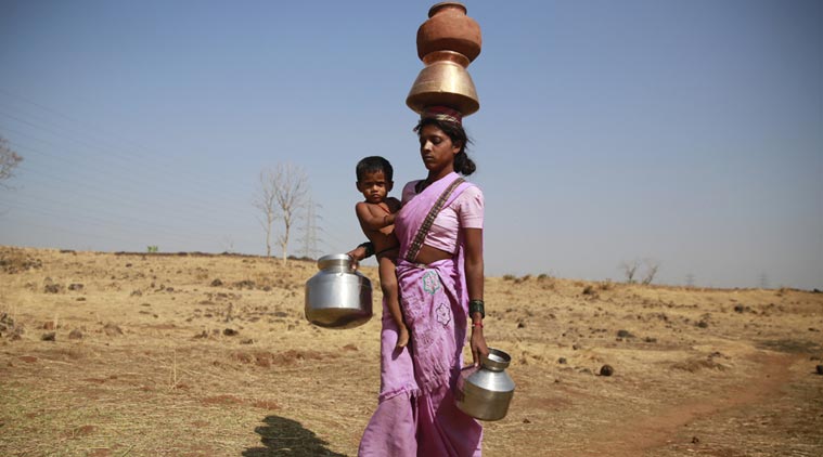 While on her way to a communal tube well at Raichi Wadi village, Mumba