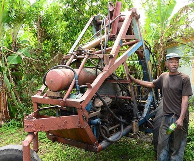 jamaican man builds cane loader out of scrap 1