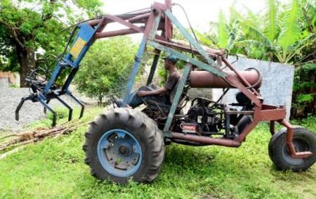 jamaican man builds cane loader out of scrap