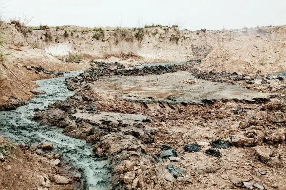 Chemicals spill out from one of the tanneries of Kanpur,