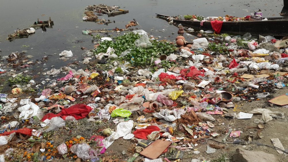 Plastic pollution of Yamuna river bank at Kalindi Kunj
