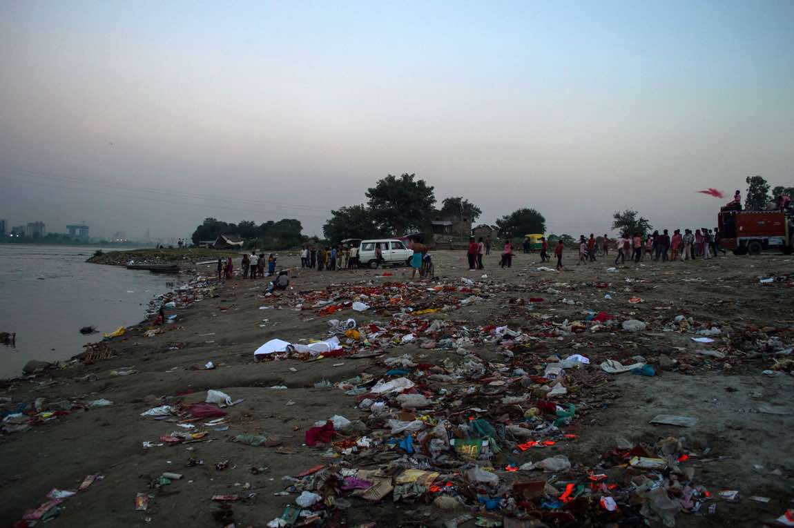 The Kalindi Kunj bank of Yamuna after a religious procession left