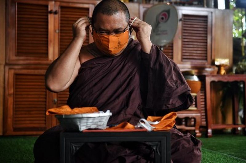 Amidst Coronavirus Buddhist Monks in Thailand Recycle Plastic to Make Face Masks