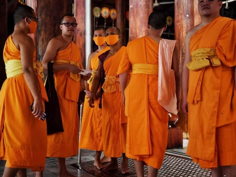 Amidst Coronavirus Buddhist Monks in Thailand Recycle Plastic to Make Face Masks