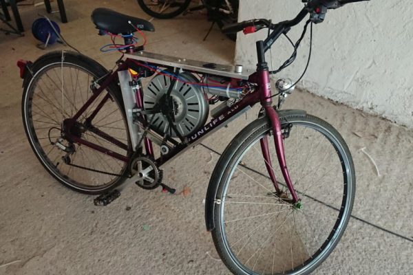 Man Builds Electric Bike out of Washing Machine Parts