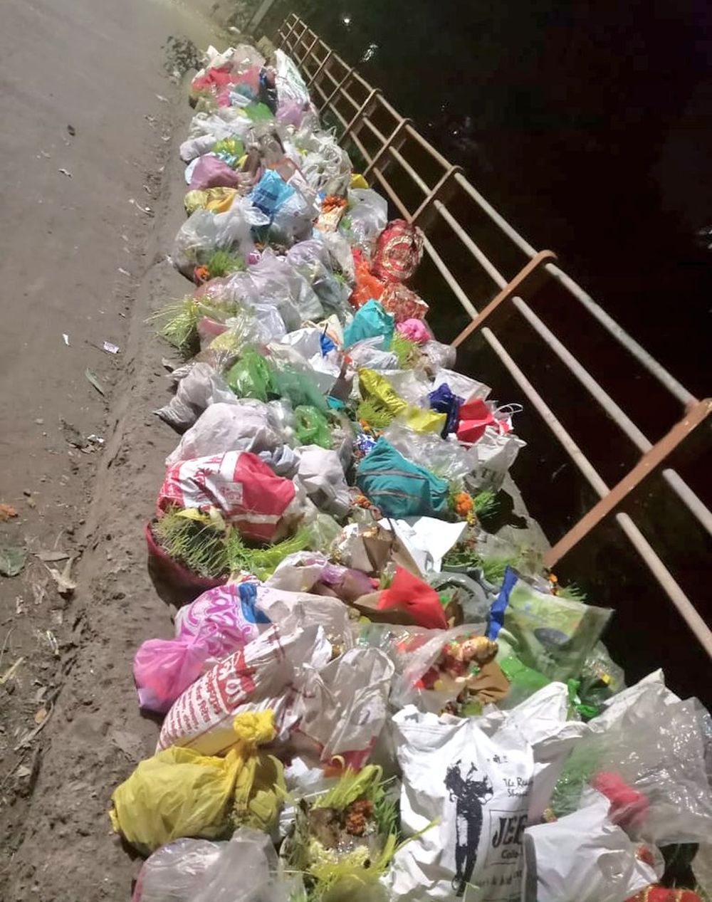 Man Stands beside Godavari to Stop People from Dumping Garbage into River