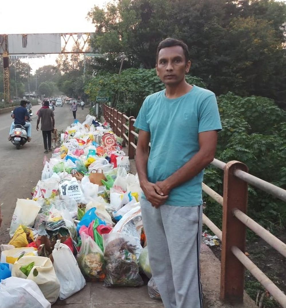 Man Stands beside Godavari to Stop People from Dumping Garbage into River