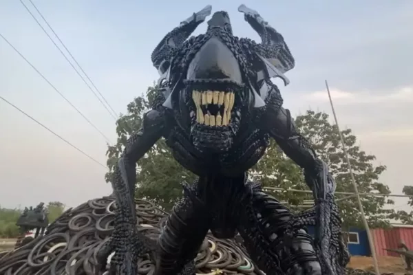 A Human Sized Alien Sculpture Made Out Of 200 Recycled Tiers