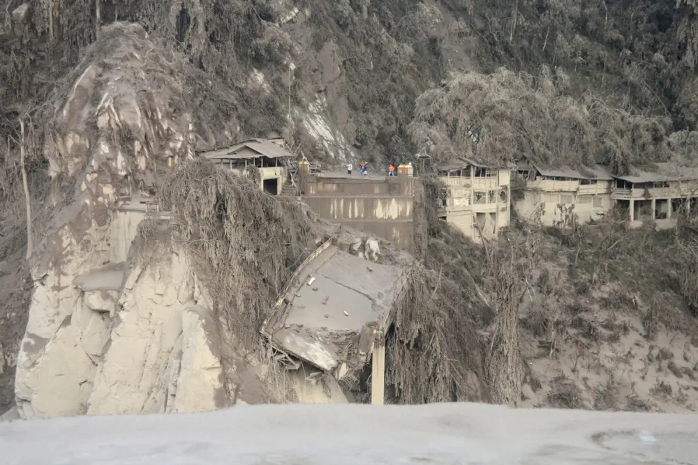 Indonesia Volcanic Eruption Buries Villages Under Hot Ash