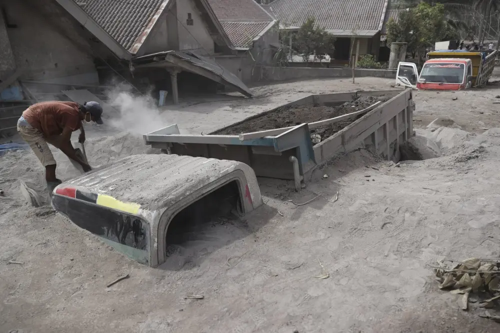 Indonesia Volcanic Eruption Buries Villages Under Hot Ash