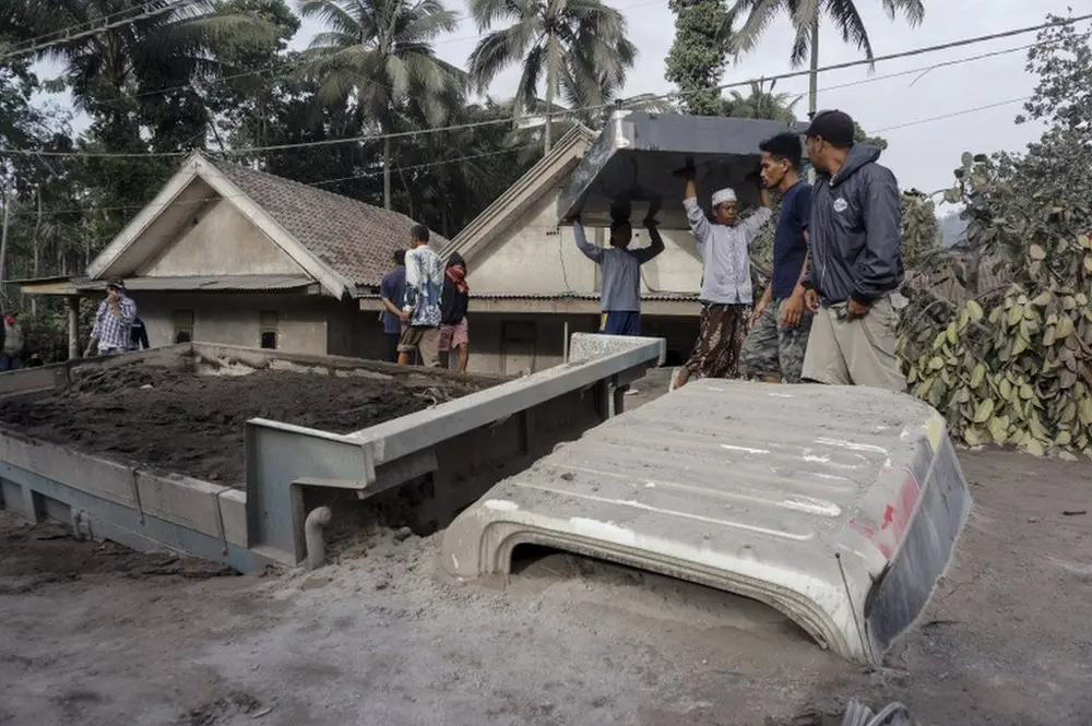 Indonesia Volcanic Eruption Buries Villages Under Hot Ash