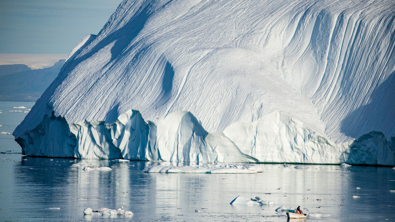 A-mountainous-iceberg-calved-from-the-Sermeq-Kujalleq-glacier-in-Greenland