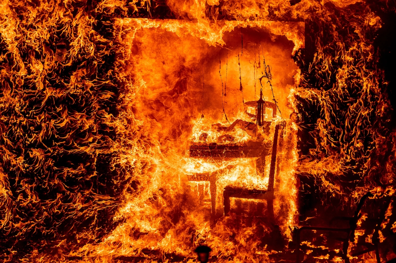 Oak Fire devouring the insides of a home in California