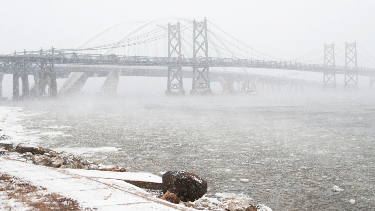 US Bomb Cyclone in Pictures: Snow and fog over the Mississippi River in Bettendorf, Iowa