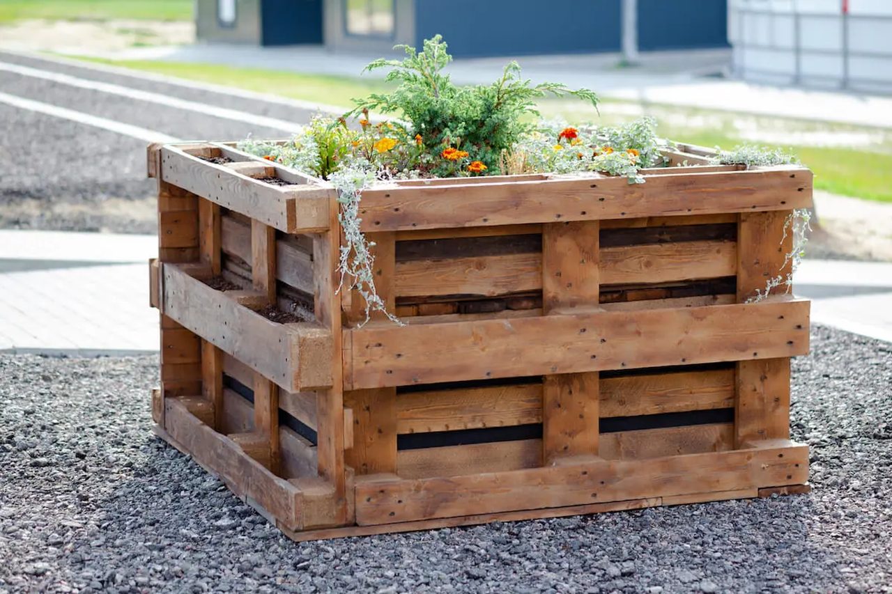 Upcycling Tips for Spring Cleaning - raised garden bed from wood pellets